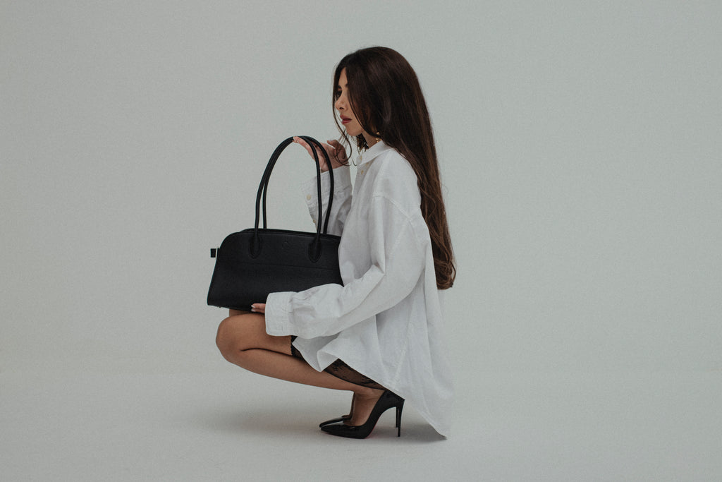 The Serena Bag — full-grain leather tote, side detail