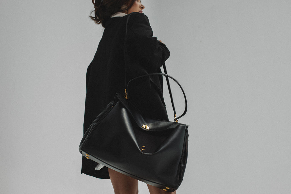 The Alessia Bag — top-grain Swift leather handbag, side detail